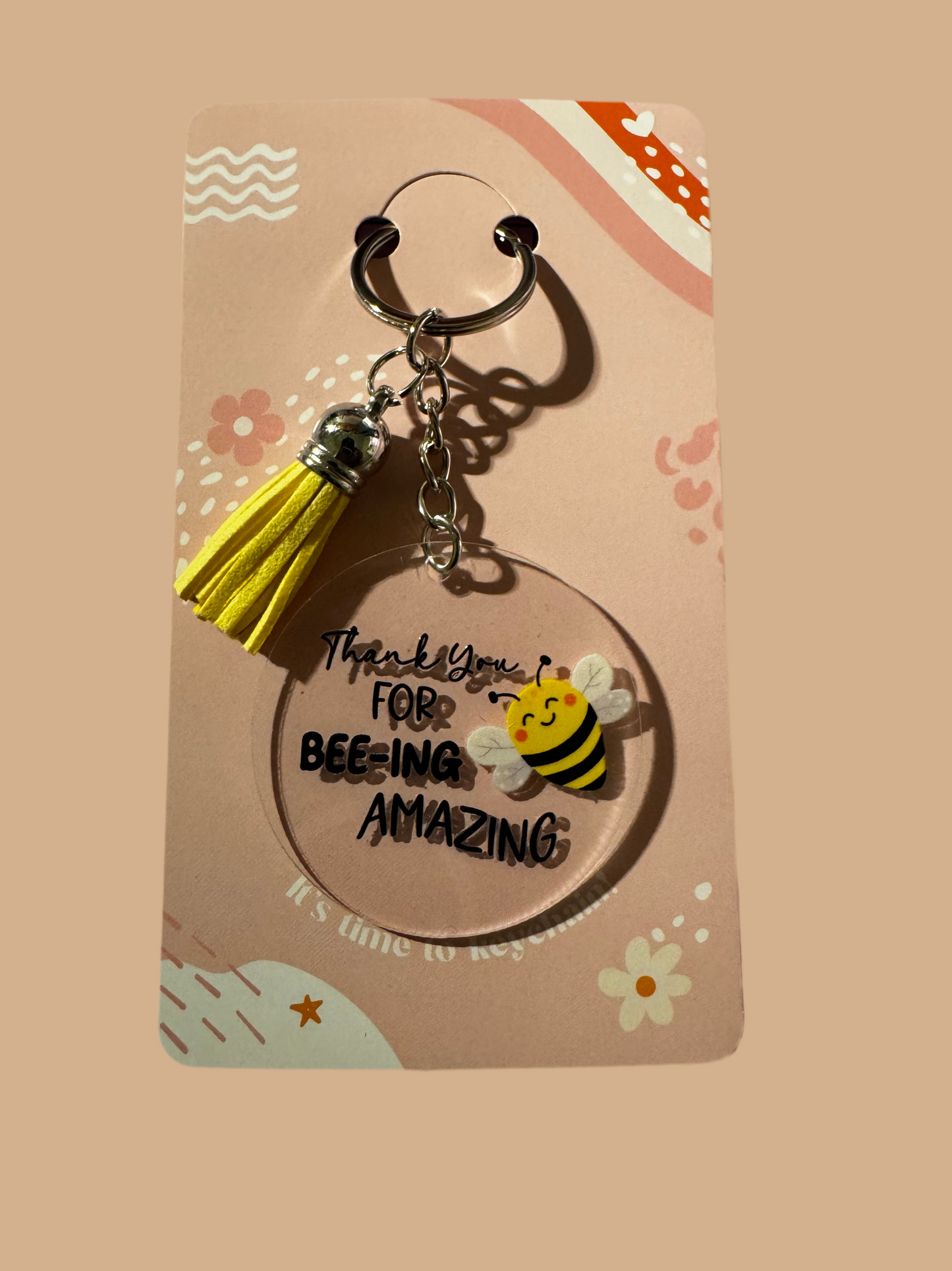 Acrylic round keychains with tassels