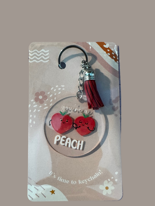 Acrylic round keychains with tassels